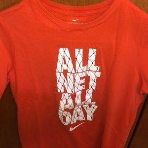 Orange Nike tee shirt
